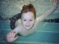 boy underwater bubbles